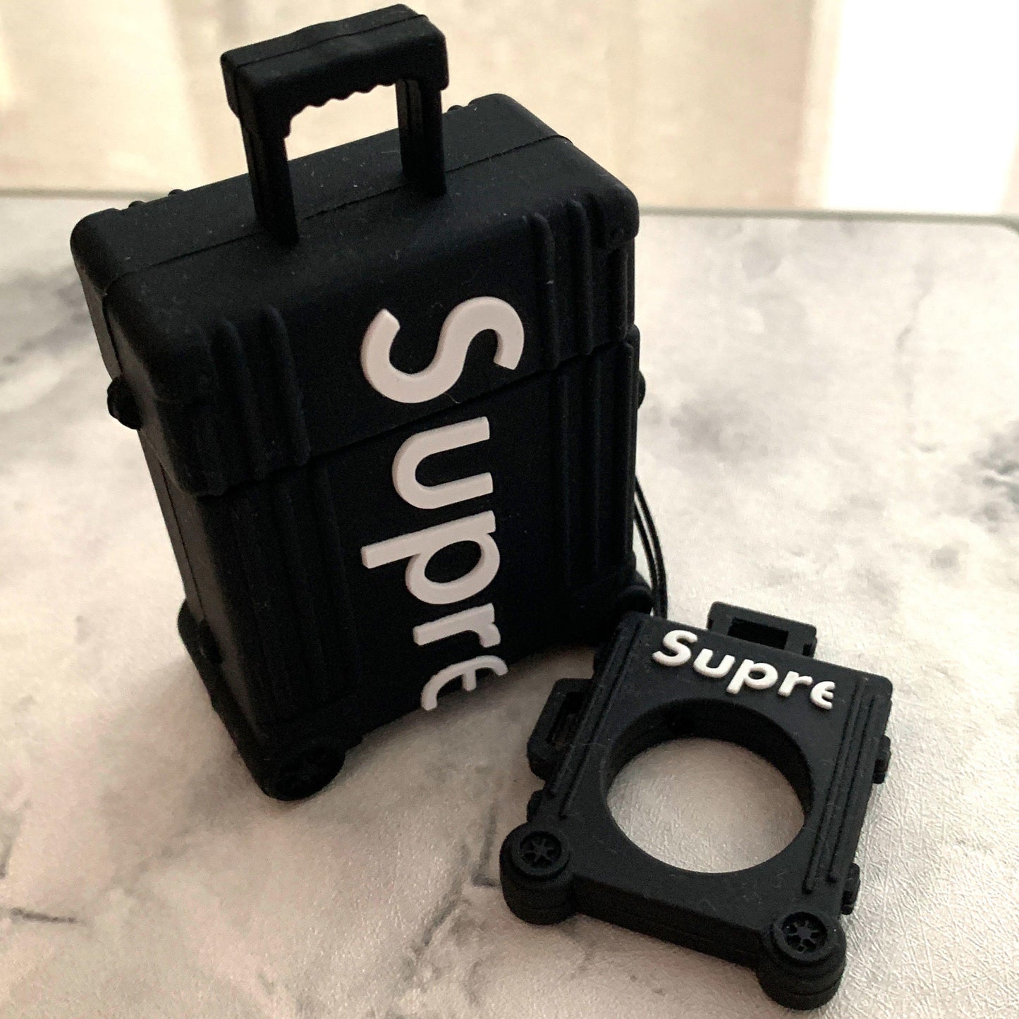 Estuche – Supreme Maleta negra para AirPods 1 y 2