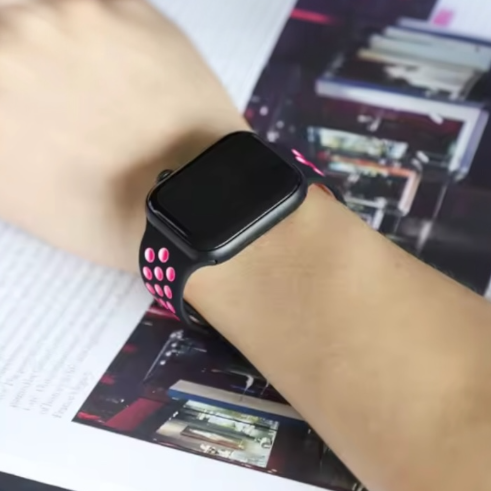 Pulsera - Deportiva Nike negro con agujeros rosados para Apple Watch
